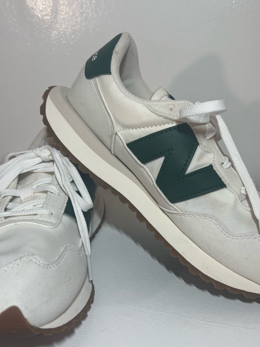 New Balance White Sneakers with Dark Green 'N' Logo and Gum Outsole